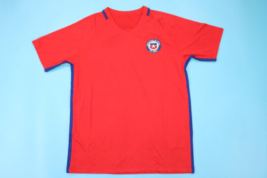 Shirt Front - Chile 2016-2017 Home Short-Sleeve Jersey Throughout the season, Chile maintained a formidable presence, showcasing their trademark grit and determination in every match they contested. Led by the experienced and inspirational Claudio Bravo, the team exhibited resilience and skill, proving themselves as worthy contenders in every competition they entered. In the Copa América Centenario, held in 2016 to commemorate the tournament's centennial anniversary, Chile embarked on a journey to defend their title. Facing stiff competition from formidable opponents, including perennial rivals Argentina, Chile once again displayed their mettle in a thrilling final showdown. Despite their historic inability to defeat Argentina in regular time, Chile triumphed in a tense penalty shootout, clinching their second consecutive Copa América title and etching their name in the annals of footballing history. Beyond the Copa América, Chile continued to assert their dominance in various international competitions, with notable performances from key players such as Alexis Sánchez, Arturo Vidal, and Eduardo Vargas. Their unwavering commitment to excellence and their never-say-die attitude propelled them to success, earning the admiration of fans worldwide and solidifying their status as a footballing powerhouse in South America. As the season drew to a close, Chile emerged as one of the continent's most formidable teams, with their sights set on future triumphs and further glory on the international stage.